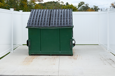 commercial dumpster outside business